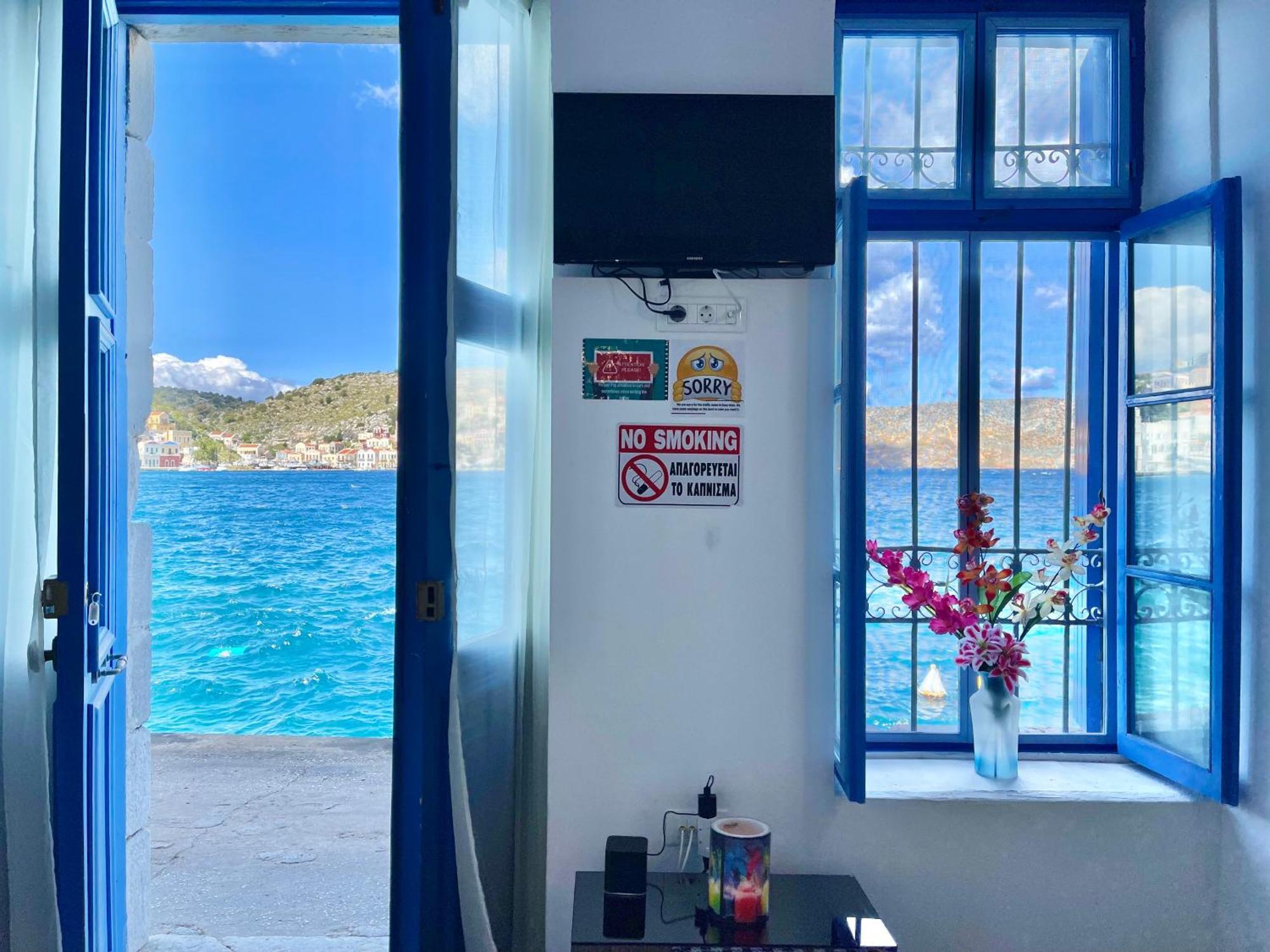 Seafront - Harbour View , Pitini 2 Apartment Symi Bagian luar foto